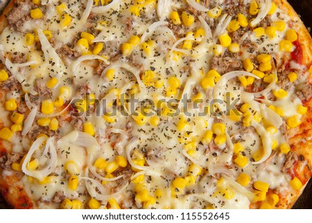 detail of pizza with tuna and corn