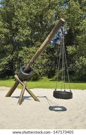 Tire swing hanging in park