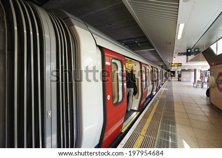 LONDON - JUNE 6: Inside view of London underground on June 6, 2014 in London, UK. London\'s system is the oldest underground railway in the world, dating back to 1863.