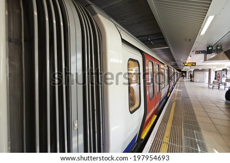 LONDON - JUNE 6: Inside view of London underground on June 6, 2014 in London, UK. London\'s system is the oldest underground railway in the world, dating back to 1863.