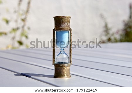 Sand Timer on table - Hourglass on table