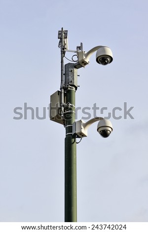 Security camera in urban street with transmitter - new technology 2015