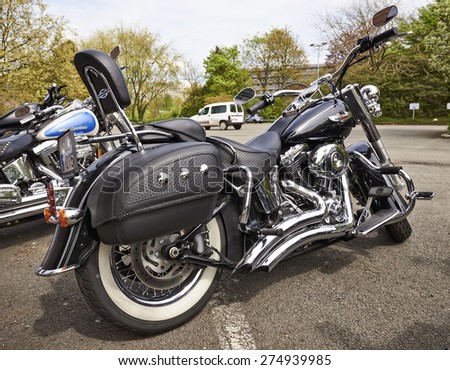 BRUSSELS, BELGIUM - May 01, 2015: Harley Davidson motorcycles lined up on the parking near the largest flea market from Brussels at Boulevard du Triomphe in Ixelles.