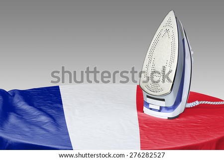 Preparing for Steam iron for smooth out the wrinkles of Flag from France