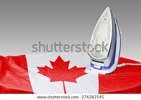 Preparing for Steam iron for smooth out the wrinkles of Flag from Canada