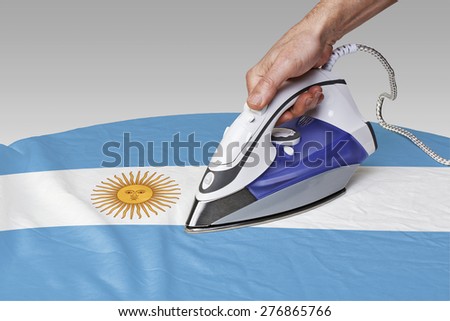 Steam iron for smooth out the wrinkles of Flag from Argentina
