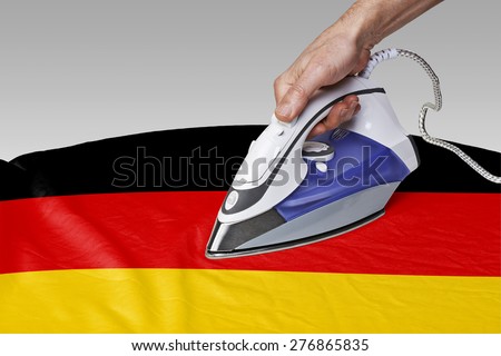 Steam iron for smooth out the wrinkles of Flag from Germany