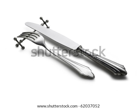 Old Fork and Knife (clipping path) This set is old, it is not brand new, the flaws in the silverware are natural. This set has often served.