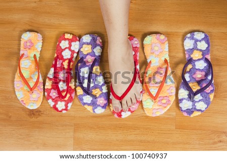 group of female shoes, woman\'s foot with shoes