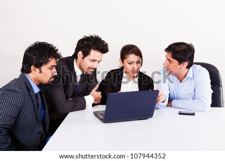 group of multi racial business people in meeting, Indian business woman in meeting with young businessmen.