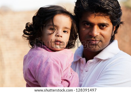 close up of father and daughter, Indian man with his one year old daughter