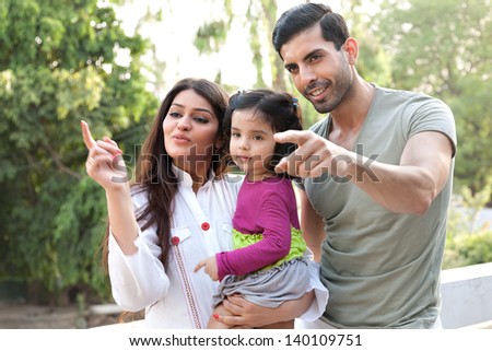 Multi Racial Family Of Three In Outdoor, Indian Family