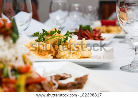 dining table set up with different kind of dishes