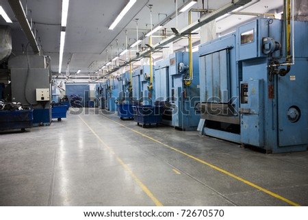 laundry machines at a factory for washing the garments in bulk.