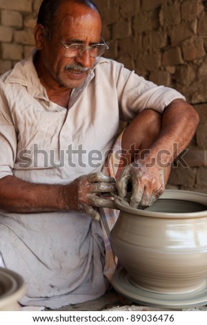 Potter Making Pots