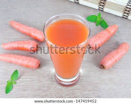 Carrot juice and carrots.
