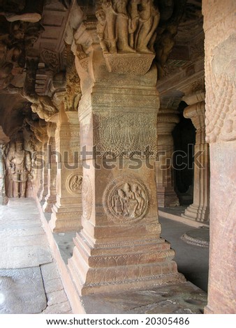 Centuries-old statue and carvings in the world famous Badami Caves in Karnataka, India.