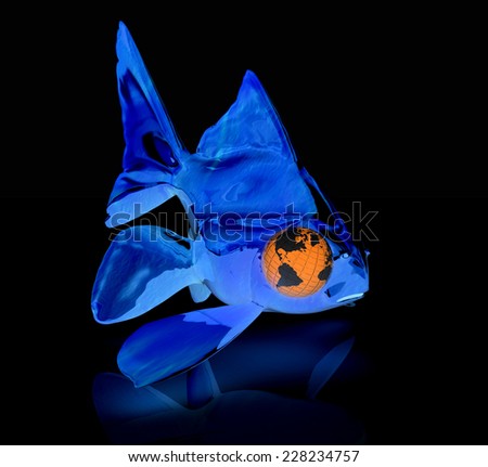 Conceptual image: fish with the earth instead of eyes. Global ecological Concept