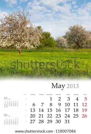2013 Calendar. May. Beautiful spring landscape in the apples garden.