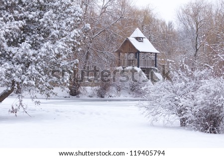 Snow-covered landscape in the city park