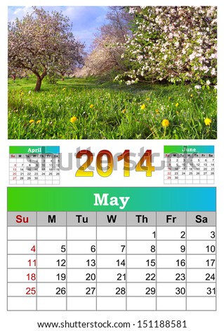 2014 Calendar. May. Beautiful spring landscape in the apples garden.
