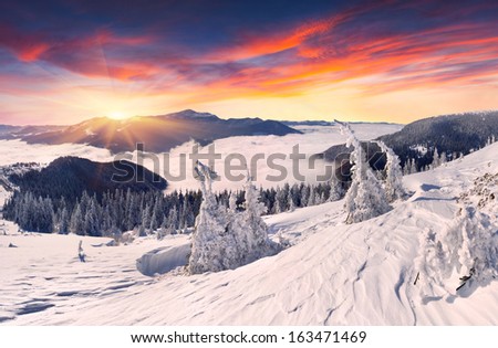 Beautiful winter sunset in the mountains