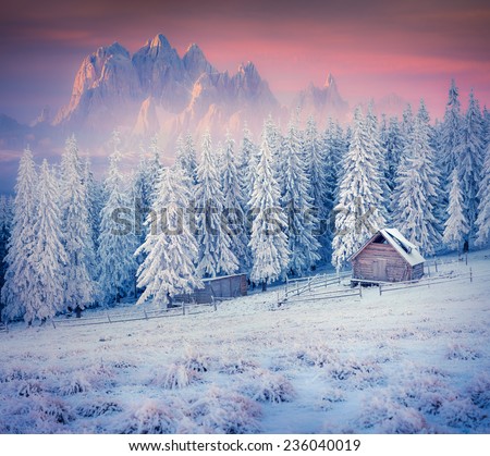 Old farm in the mountains. Colorful winter morning. Retro style.