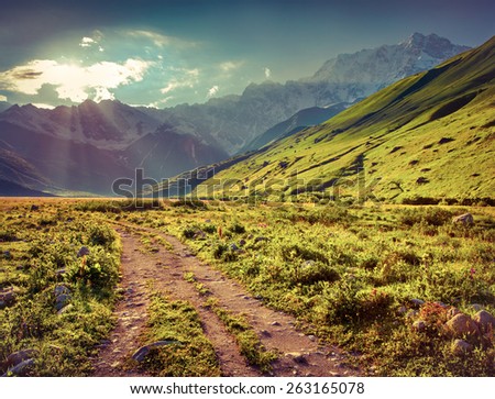 The main Caucasian ridge Shkhara mountain The view from the Ushguli village Georgia Upper Svaneti Retro style The main Caucasian ridge Shkhara mountain The view from the Ushguli village Georgia Upper Svaneti Retro style