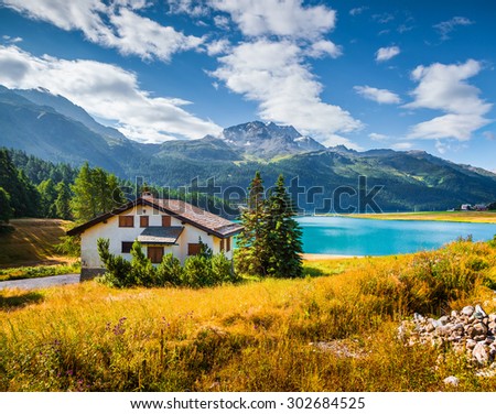 Colorful summer morning on the Silvaplana village.  Champferersee lake, Alps, Switzerland, Europe.