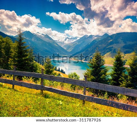 Colorful summer morning on the Speicher Durlassboden lake in the Austrian Alps.