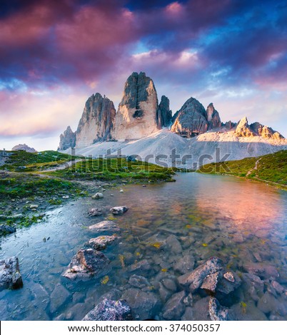Colorful summer scene on the lake Rienza - Ursprung in National Park Tre Cime di Lavaredo. Sunrise in Dolomite, South Tyrol. Location Auronzo, Italy, Europe.