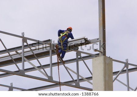 stock-photo-rigger-assembling-a-steel-structure-1388766.jpg