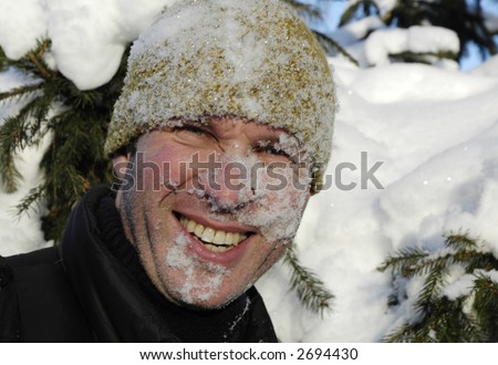 Man with snow on his face