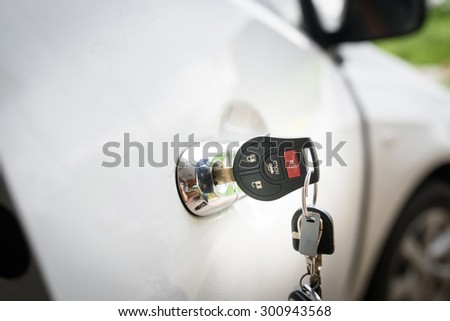 Car keys left in a lock, at Parking lot