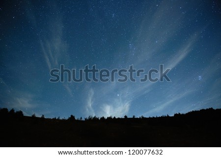 Blue dark night sky with many stars. Space background