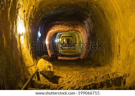 Mysterious dungeon- tunnel with walls made of stone