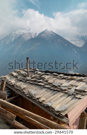 Tibetan village in Himalayan mountain with blue sky.