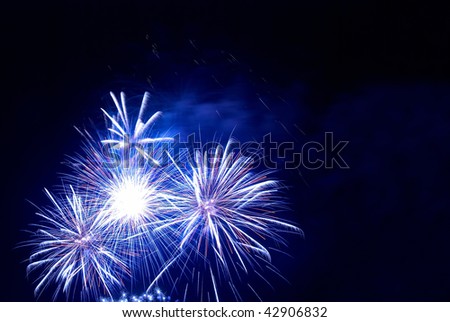 Beautiful fireworks with copyspace left or right.