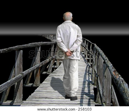 Senior man walking down path