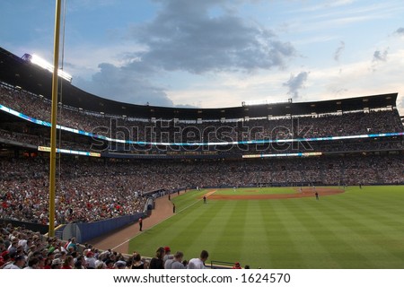 record crowd at Turner Field; night game, with amazing sky