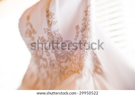 embroidery of the wedding dress - selective focus effect