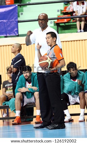 BANGKOK- JAN25:Joe Bryant head coach of Chang Thailand Slammers talk with referee in ASEAN Basketball League 