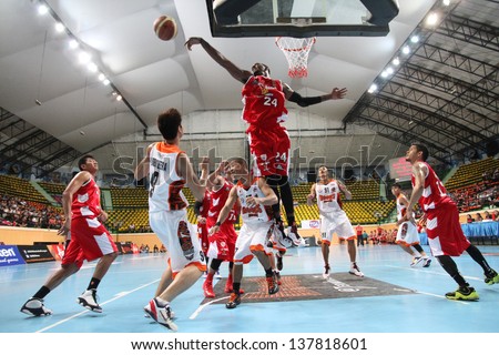 BANGKOK - APRIL 24:Justin Williams #24 of San Miguel Beermen jump shot for block in an ASEAN Basketball League \