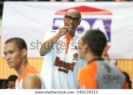 BANGKOK - MAY 28:Joe Bryant head coach ofSports Rev Thailand Slammers talk with referee in ASEAN Basketball League \