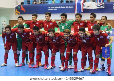 INCHEON - July 4:Thailand futsal team shoot photo before start games against Iran in the 4th Asian Indoor and Martial Arts Games at Songdo Global University on July 4, 2013 in Incheon, Korea.