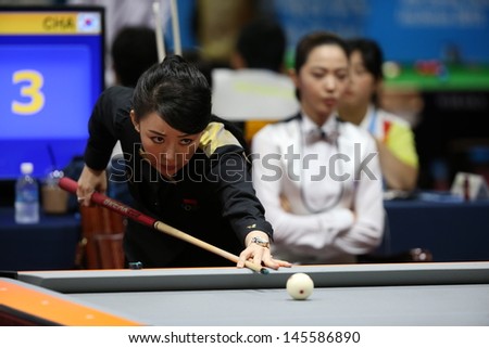 INCHEON - July 3:PAN Xiaoting billiard player of China participates in an 4th Asian Indoor and Martial Arts Games 2013 at Songdo Convensiaon on July 3, 2013 in Incheon, South Korea.