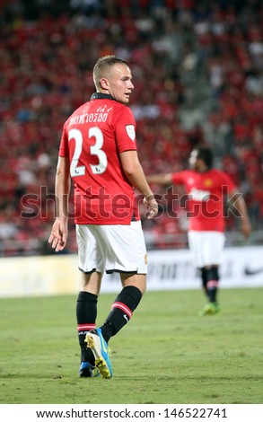 BANGKOK - JULY 13:Tom Cleverley of Man Utd. in action during Singha 80th Anniversary Cup Manchester United vs Singha All Star at Rajamangala Stadium on July 13,2013 in Bangkok, Thailand.