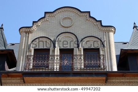 New style balcony in Northern Caucasus. Traditional russian architecture.