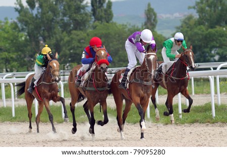 PYATIGORSK, RUSSIA - JUNE12: (L - R) Jockeys Imran Mardanov,Aid Kardanov,Rinat Hamidullin and Adel Aituganov.Horse race for the prize of the Probni on June 12, 2011 in Pyatigorsk, Caucasus, Russia.