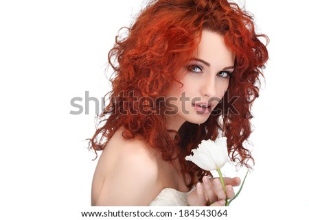 beautiful young redheaded girl with white tulips, isolated on a white background